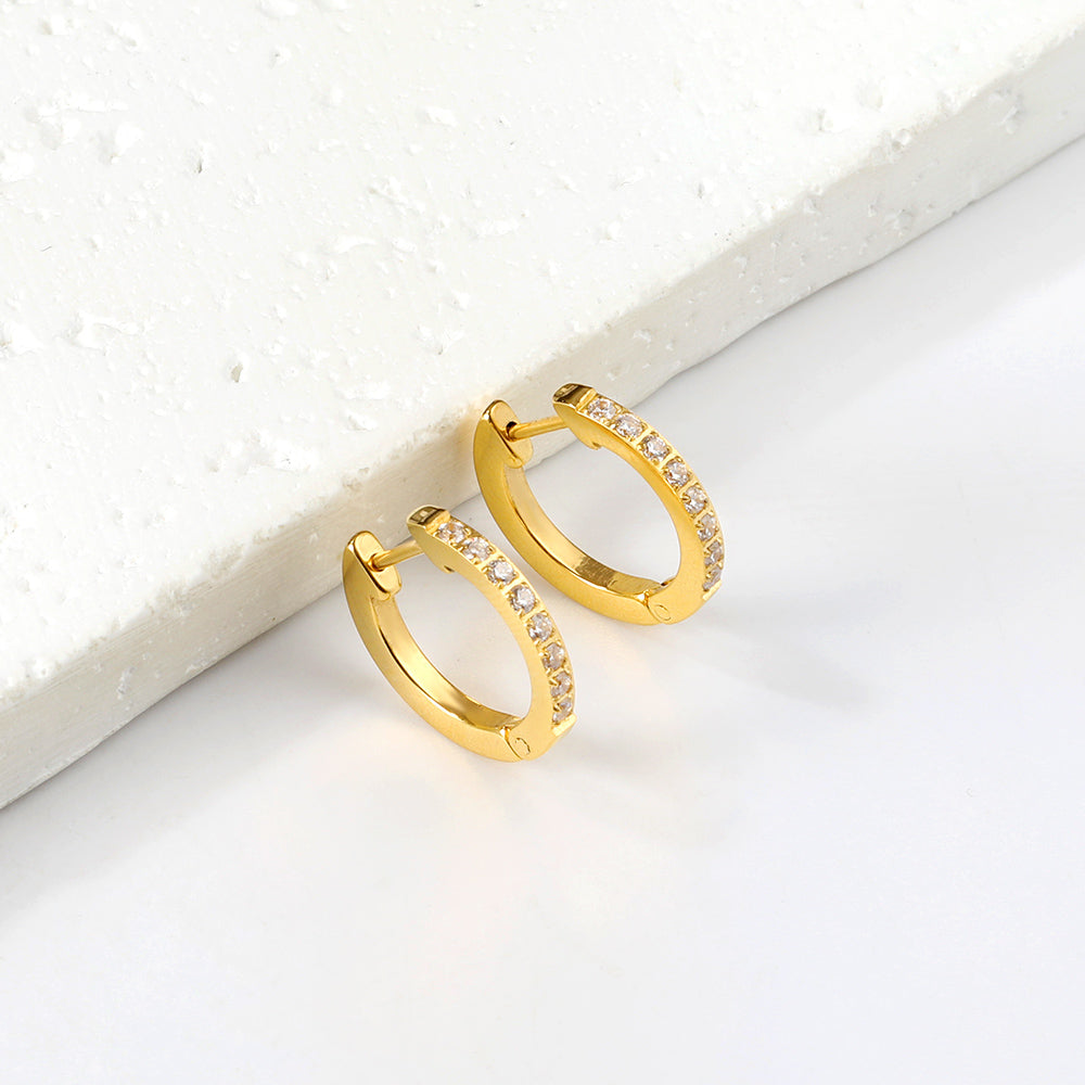 Boucles d'oreilles brillantes rondes dorée