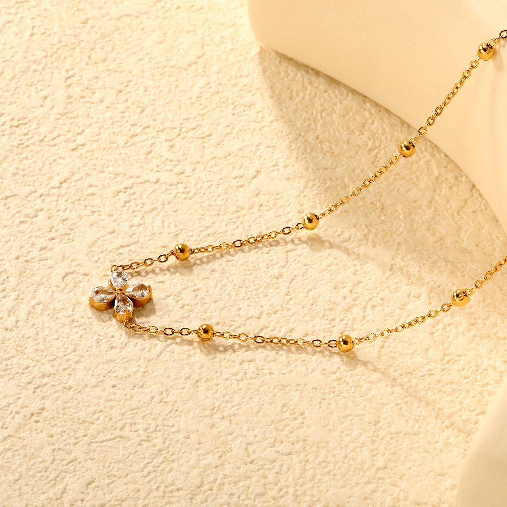 Collier fleur dorée