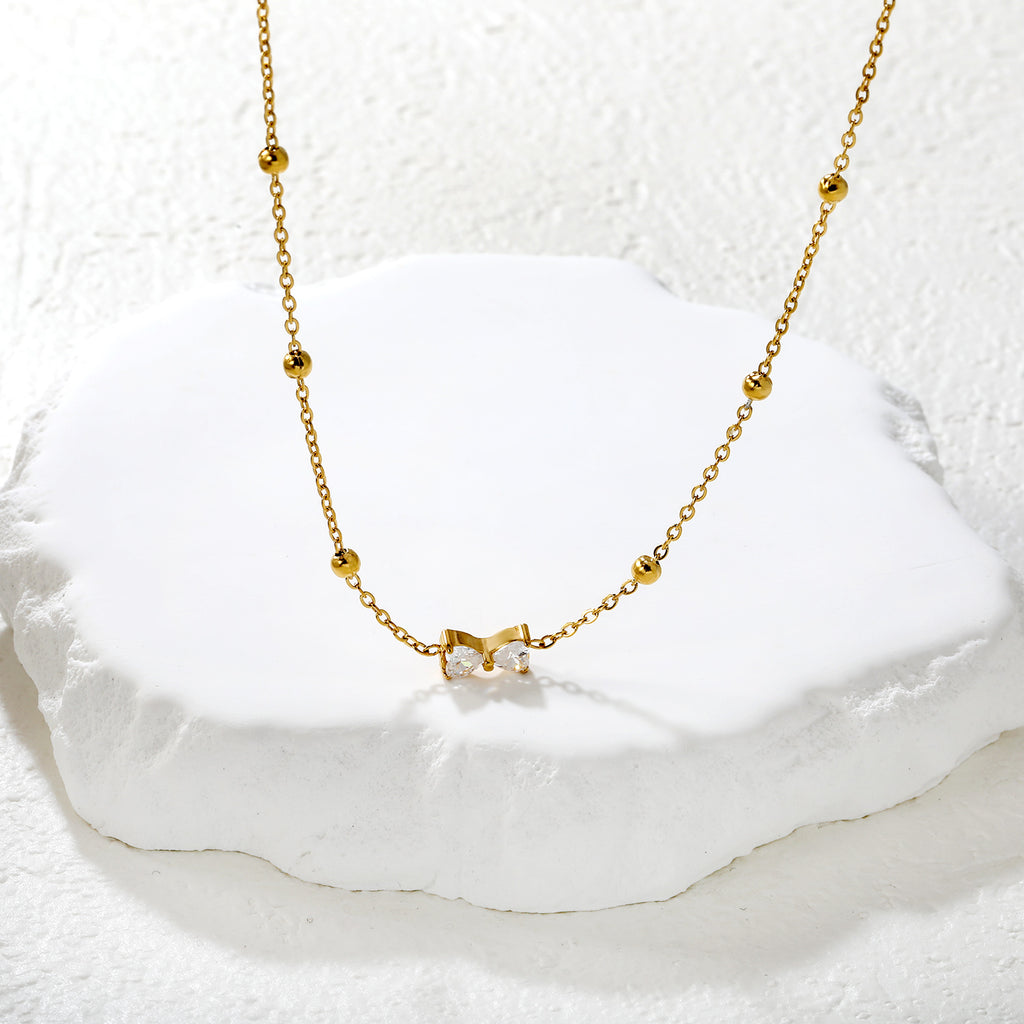 Collier nœud dorée