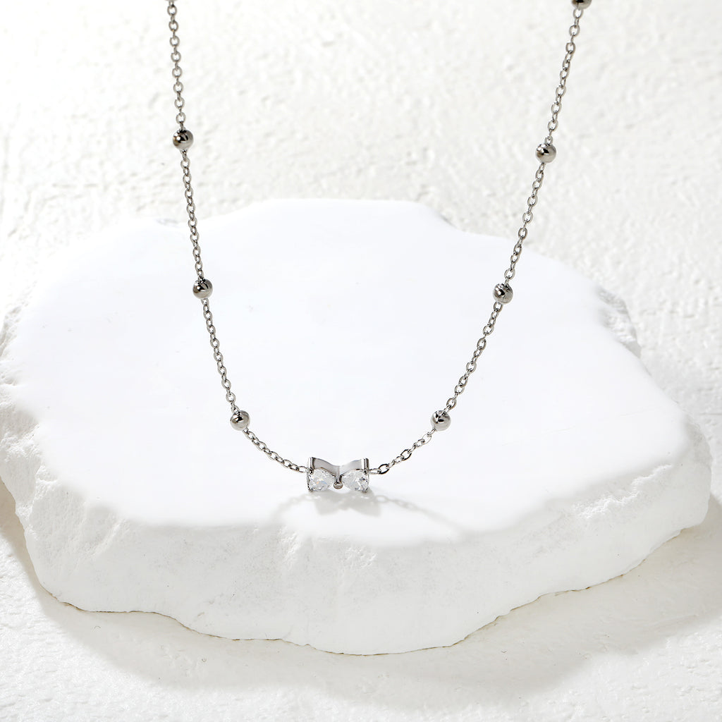 Collier nœud argenté