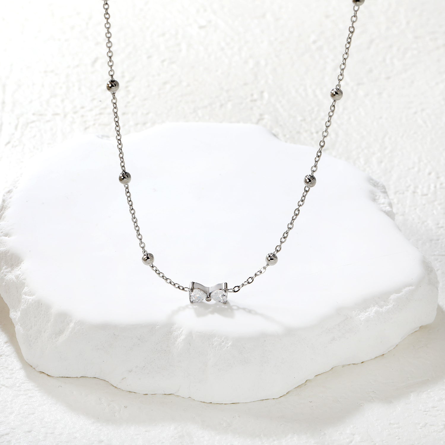 Collier nœud argenté