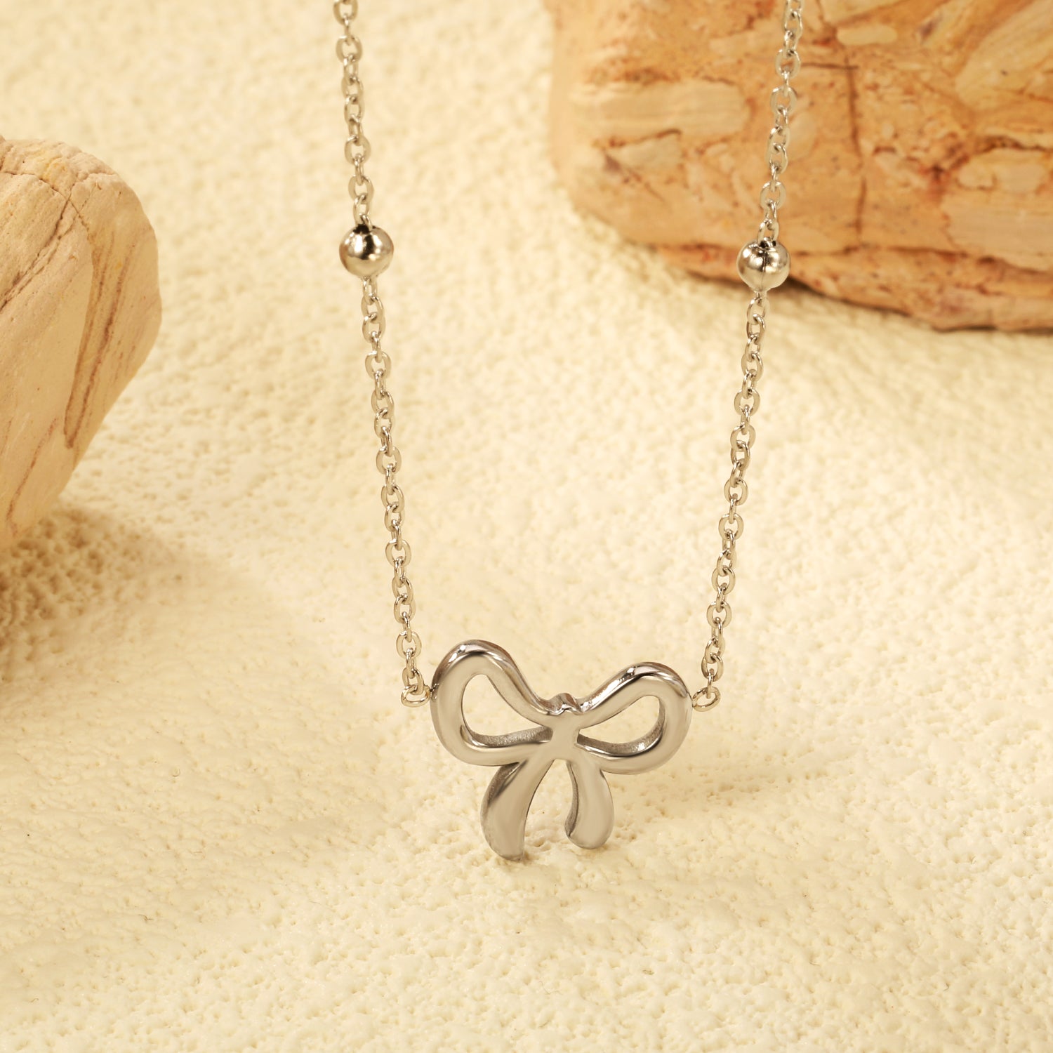 Collier boucle argenté