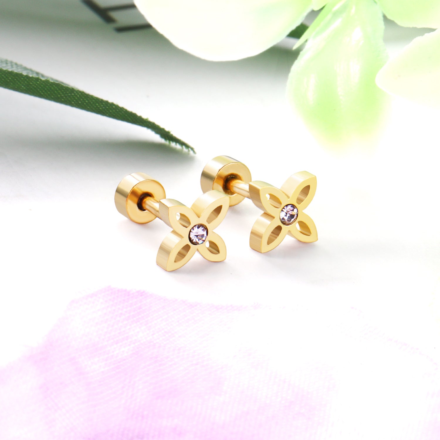 Boucles d'oreilles X dorée