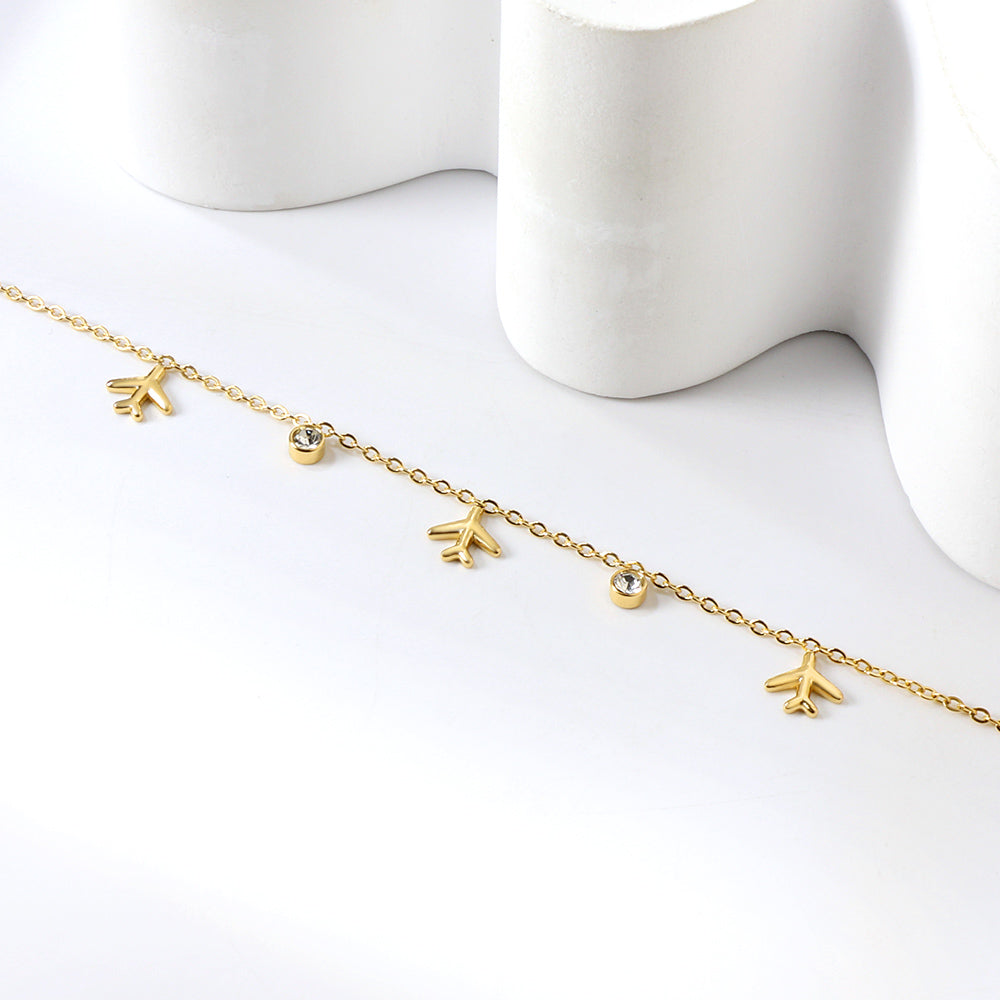 Bracelet voyage charms dorée