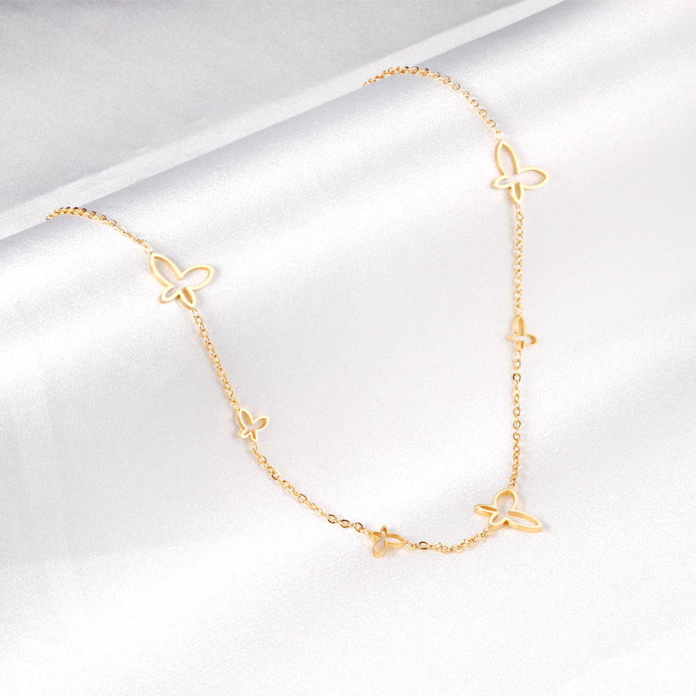 Collier papillon charms dorée